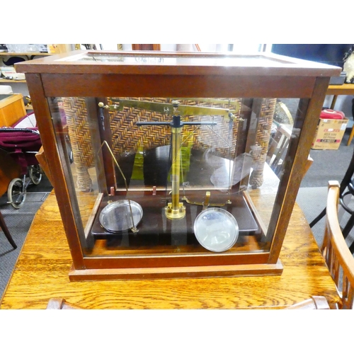 574 - A cased set of antique/ vintage chemists scales.