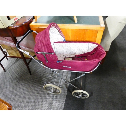 579 - A vintage dolls pram.