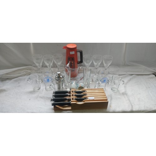 591 - A boxed lot to include a knife block, vintage flask, glasses and more