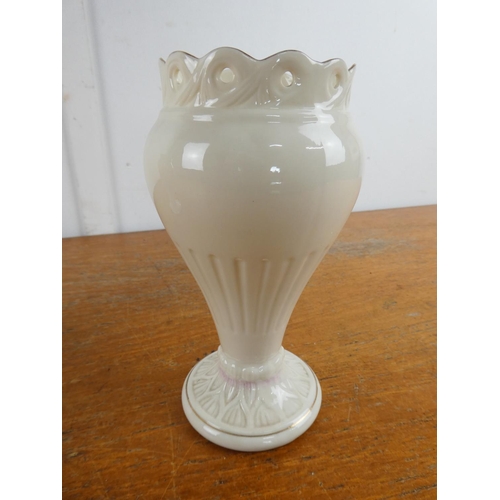 100 - A pair of Belleek pottery vases.