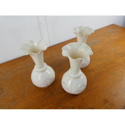 101 - A set of three Belleek pottery 'Rossmore' vases.