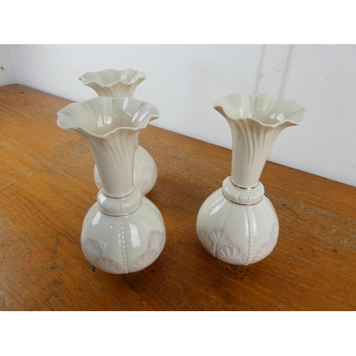 101 - A set of three Belleek pottery 'Rossmore' vases.