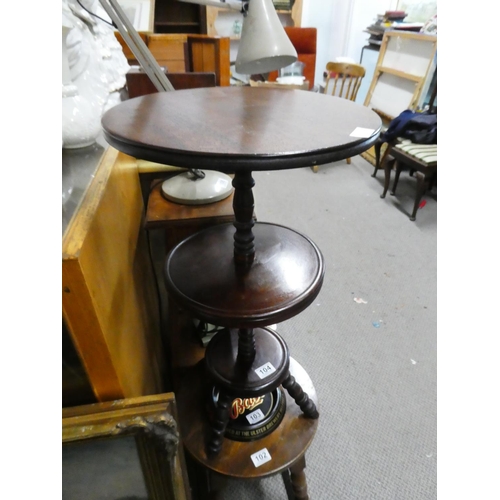 104 - An unusual three tier mahogany table, measuring 27