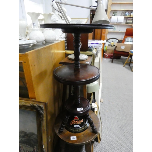 104 - An unusual three tier mahogany table, measuring 27