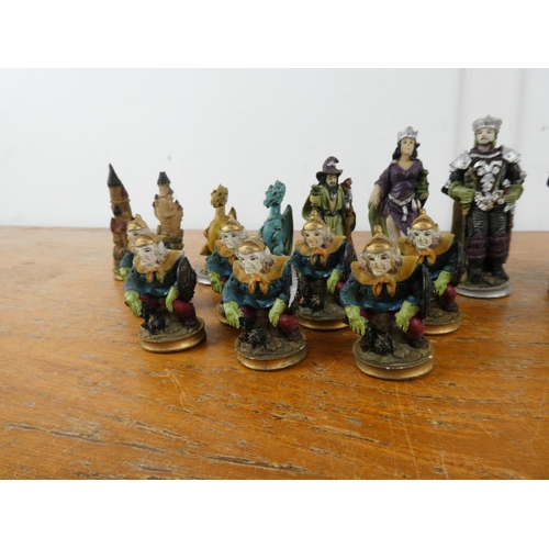 105 - A collection of figurine chess pieces.