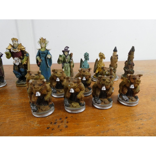 105 - A collection of figurine chess pieces.