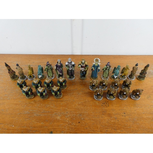 105 - A collection of figurine chess pieces.