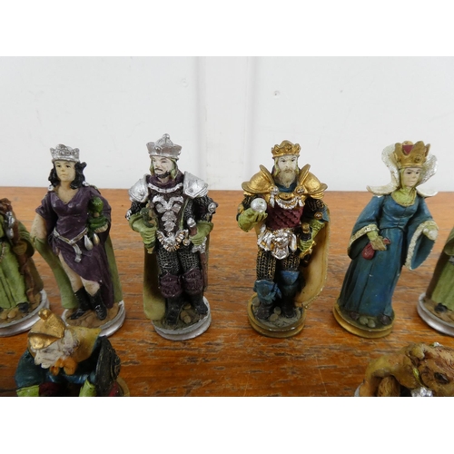 105 - A collection of figurine chess pieces.