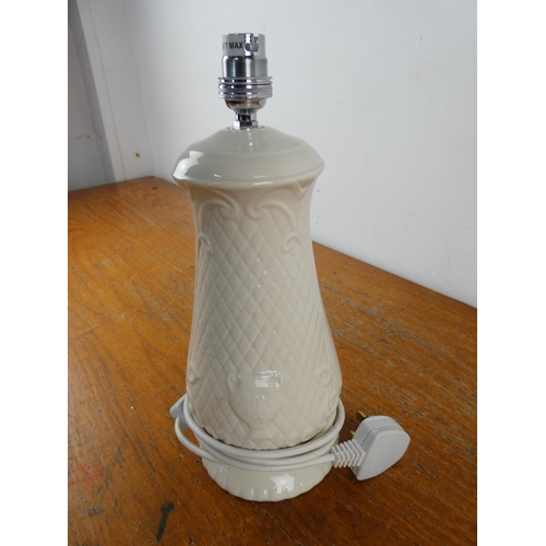 106 - A Belleek pottery table lamp base.