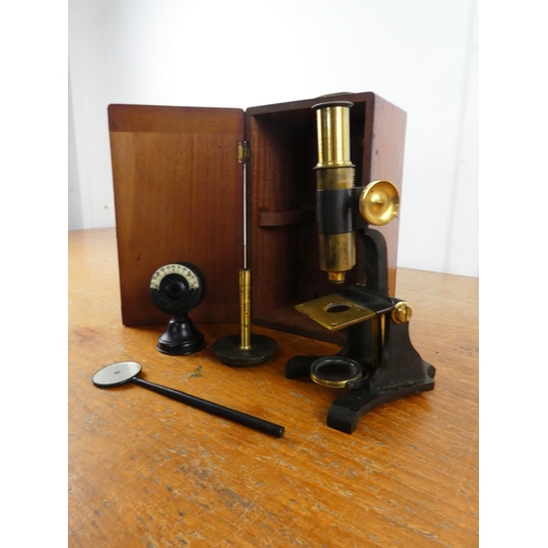 115 - A stunning cased brass microscope.