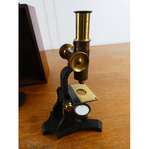 115 - A stunning cased brass microscope.