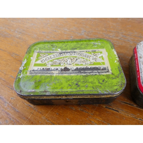 117 - A lot of four vintage tobacco tins.