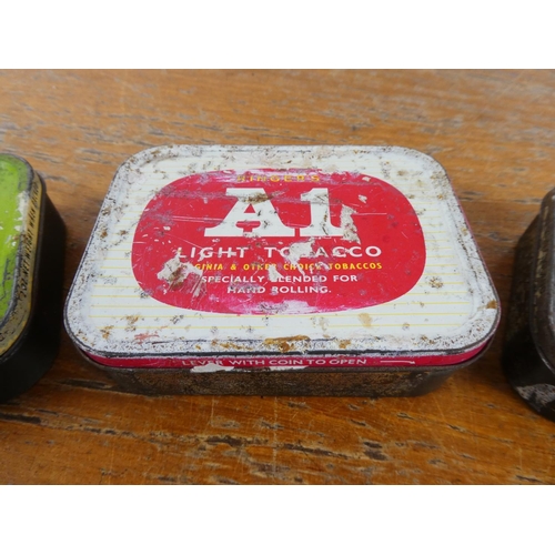 117 - A lot of four vintage tobacco tins.