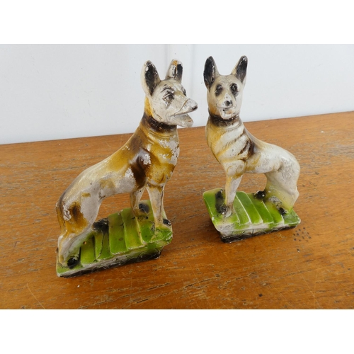 121 - A pair of vintage plaster mantle dogs.