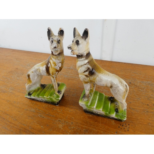 121 - A pair of vintage plaster mantle dogs.