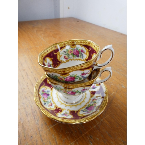 130 - A stunning Royal Albert 'Lady Hamilton' tea set with cake plate, milk jug and sugar bowl.