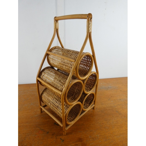 141 - A vintage bamboo and wicker bottle holder.