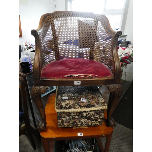 146 - A stunning antique Georgian walnut cane tub chair with ball and claw feet.