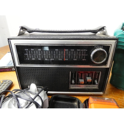 151 - A box lot of electrical items including a vintage black & white Tv/radio and more.