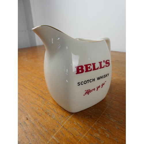 160 - A vintage Wade Bell's Scotch Whiskey jug.