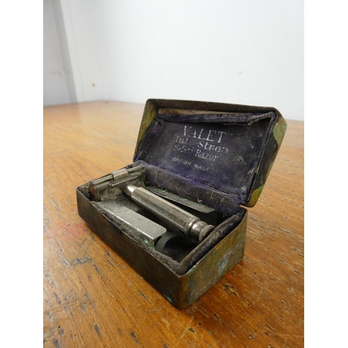 164 - A vintage 'Valet' razor in original metal box.