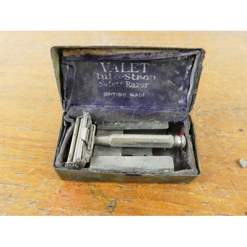 164 - A vintage 'Valet' razor in original metal box.