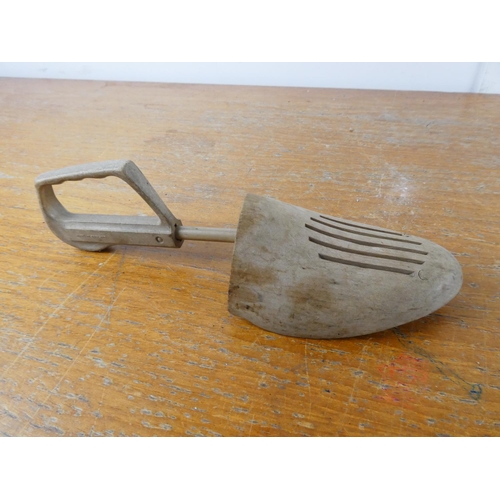 171 - A vintage wooden shoe stretcher and another.