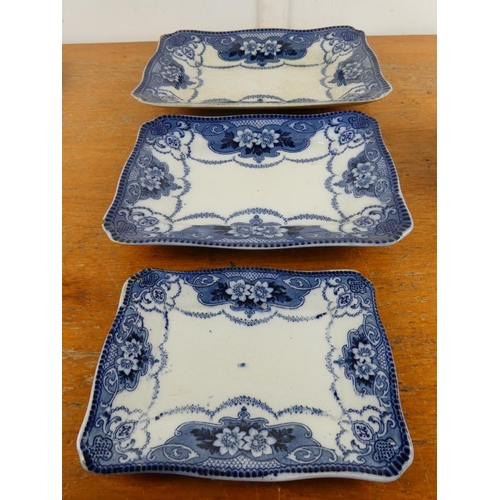 202 - A collection of antique blue and white Burslem platters and more.