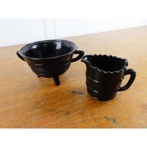 207 - A vintage glass sugar bowl and milk jug.