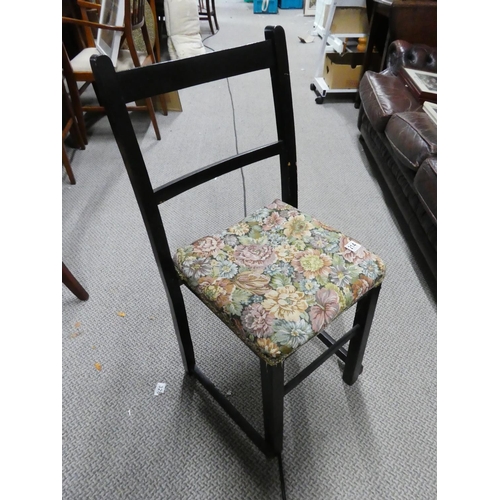 214 - An upholstered chair.