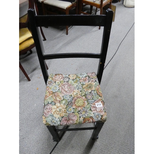 214 - An upholstered chair.