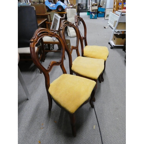 222 - A stunning set of three antique mahogany balloon back dining room chairs.