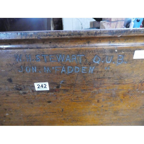 242 - A stunning antique school desk inscribed W H Stewart Q.U.B. and Jon McFadden.