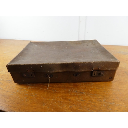 243 - A vintage leather case containing a lot of various antique sheet music, case measuring 18