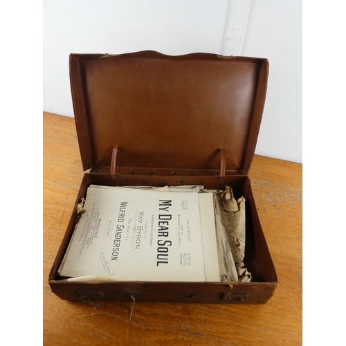 243 - A vintage leather case containing a lot of various antique sheet music, case measuring 18