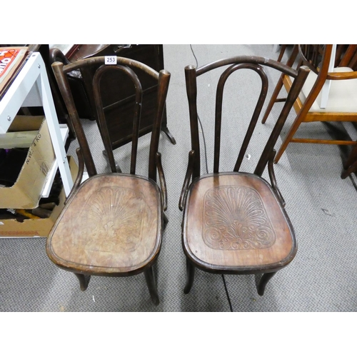 253 - A pair of Bentwood style chairs and another balloon back chair.