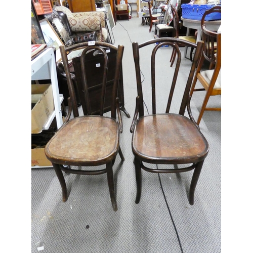 253 - A pair of Bentwood style chairs and another balloon back chair.