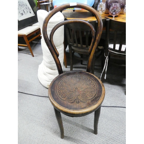 253 - A pair of Bentwood style chairs and another balloon back chair.