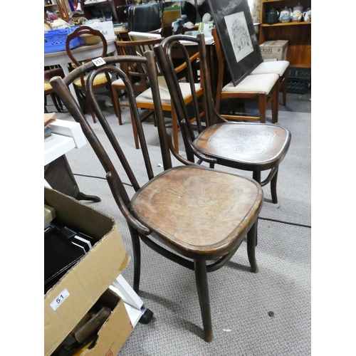 253 - A pair of Bentwood style chairs and another balloon back chair.