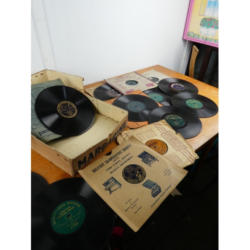 264 - A vintage Echo Margarine box and a collection of gramophone records.