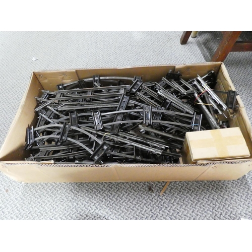 286 - Two large boxes of Hornby train track and a box of Honby connecting plates.