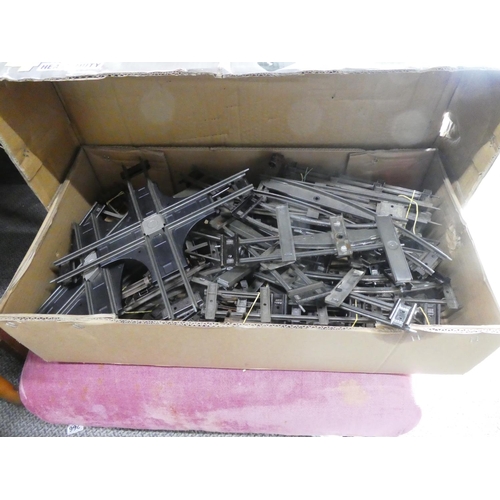 286 - Two large boxes of Hornby train track and a box of Honby connecting plates.