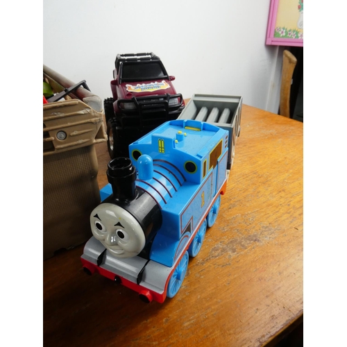 288 - A large assortment of toys to include Thomas the Tank.