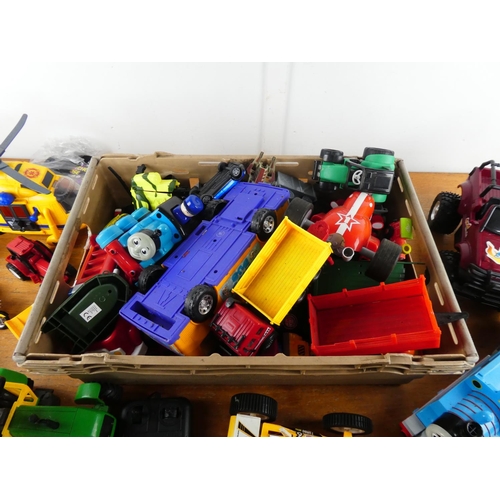 288 - A large assortment of toys to include Thomas the Tank.