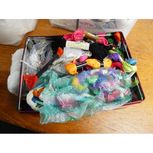 291 - A box of assorted tapestry thread, fabric and more.