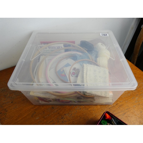 291 - A box of assorted tapestry thread, fabric and more.