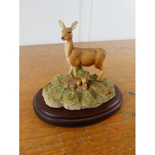 301 - A Border Fine Art figurine by The Chiltern Collection 'Deer' on wooden plinth.