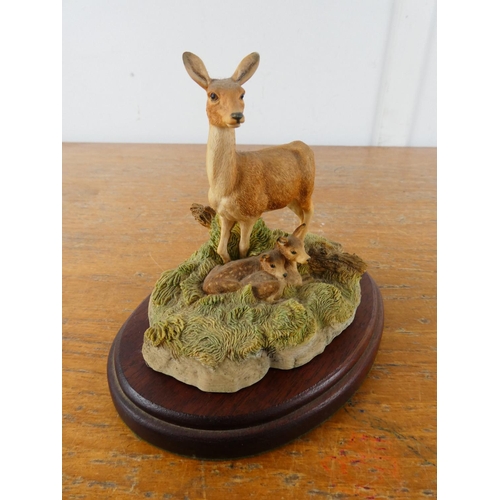 301 - A Border Fine Art figurine by The Chiltern Collection 'Deer' on wooden plinth.