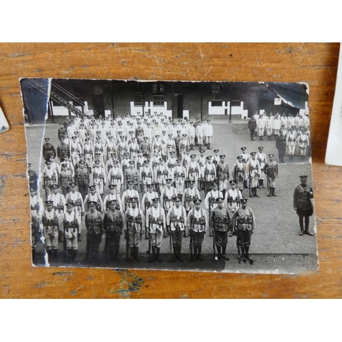 309 - A vintage military photograph and a lot of postcards.