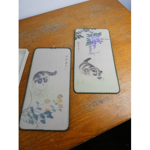 31 - Two 1950's Chinese rice paper or silk panels depicting cats and flowers.
